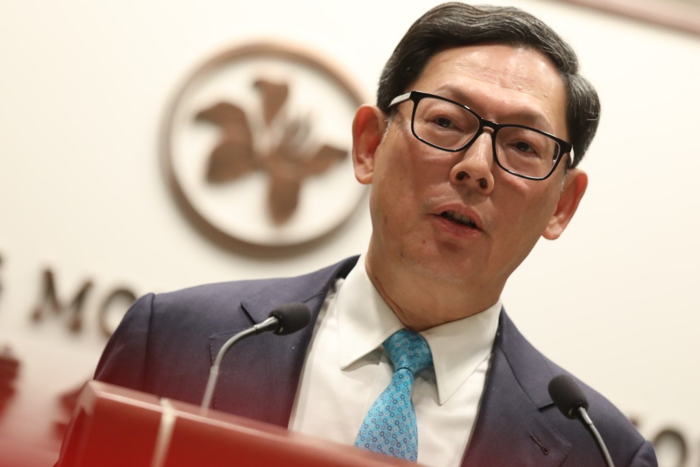 Norman Chan Tak-lam, chief executive of the Hong Kong Monetary Authority, attends a press conference in Central to announce the performance of the Exchange Fund in 2018. Photo: K. Y. Cheng