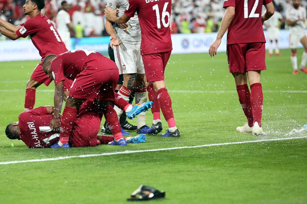 UAE fans throw bottles and flip-flops during the AFC Asian Cup semi-final match against Qatar in Abu Dhabi. Photo: EPA