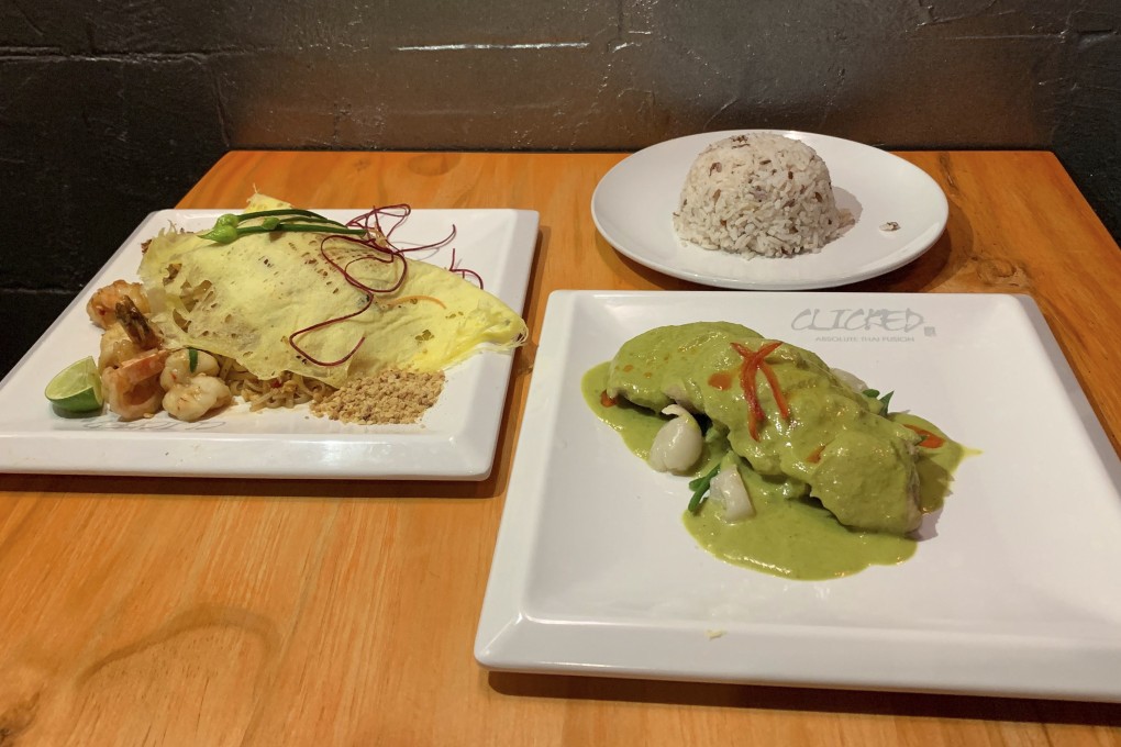 Green coconut milk duck breast and Clicked pad Thai with tiger prawns and salted egg at Clicked in Sheung Wan. Photo: Simone McCarthy