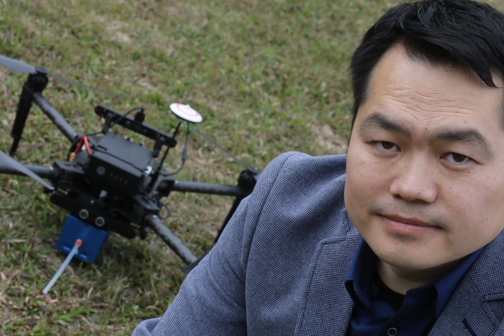 Research leader Dr Zhi Ning with one of the drone models. Photo: Dickson Lee