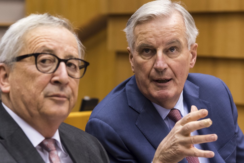 EU Commission President Jean Claude Juncker (left) and European Union chief Brexit negotiator Michel Barnier talk during a plenary session at the European Parliament in Brussels on Wednesday. Leaders across the European Union offered a united chorus of “No” on Wednesday to Britain's belated bid to negotiate changes to the Brexit divorce deal so that Prime Minister Theresa May can win the backing of her Parliament. Photo: AP