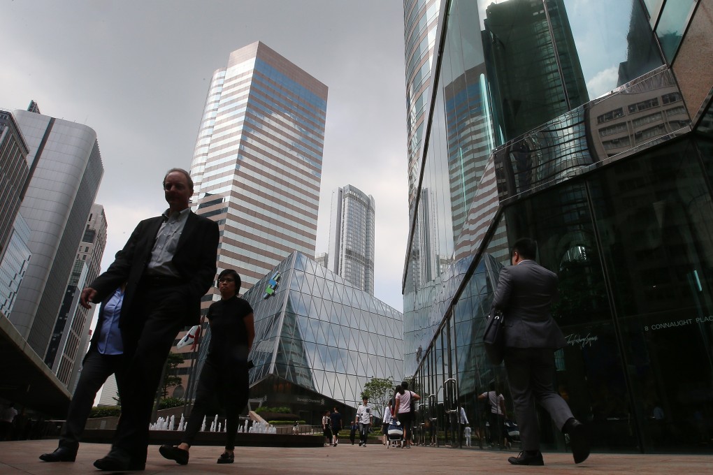 Hong Kong did better than mainland China when it comes to salaries in banking and financial services, its mainstay industry. But Singapore leads Asia in the sector. Photo: K. Y. Cheng