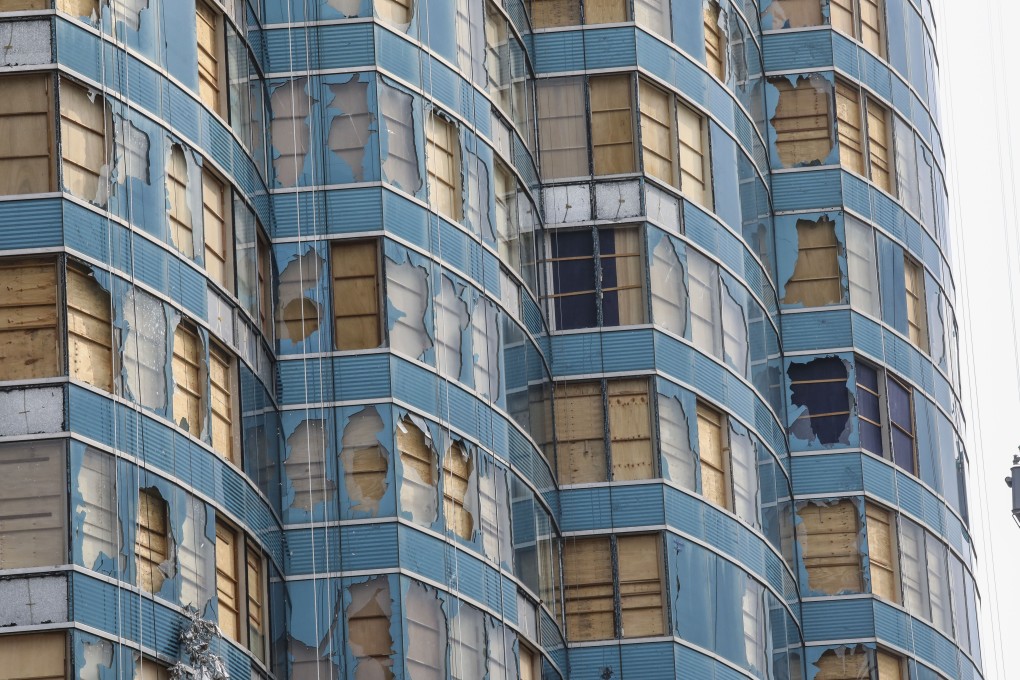 Broken windows at an office building in Hung Hom, in the aftermath of Typhoon Mangkhut, which hit Hong Kong in September 2018. The storm caused damage worth US$2 billion across Asia. Photo: Dickson Lee