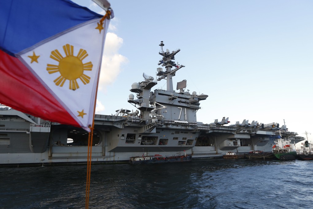 The US aircraft carrier Theodore Roosevelt, anchored off Manila Bay for a reception for top Philippine military and government officials in April. Photo: AP