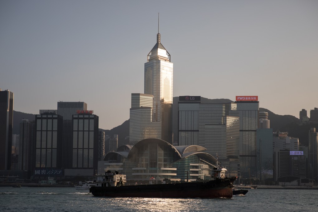 A boat on Victoria Harbour sails past the Wan Chai and Causeway Bay districts on December 17, 2018. Hong Kong is home to more than 1,350 US companies, including many which have regional headquarters or regional offices here. Photo: EPA-EFE