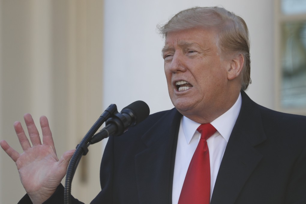 In this January 25, 2019, photo, President Donald Trump speaks in the Rose Garden of the White House in Washington. While government reopens, Trump remains behind closed doors. Since Saturday, Trump has listed no public events on his schedule and has provided few details on his doings. (AP Photo/Jacquelyn Martin)