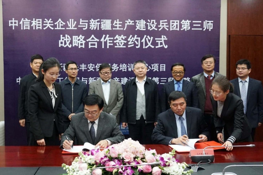 The FSG statement came with a photo of a signing ceremony related to the FSG training base. Photo: Handout