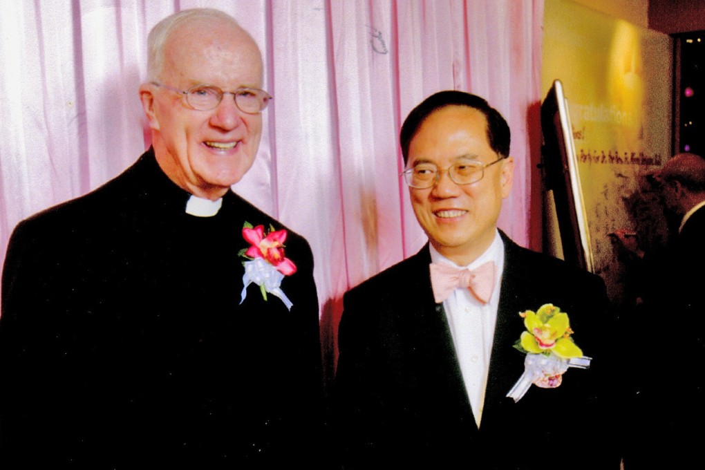Father Alfred Deignan (left) with Donald Tsang. Photo: Wah Yan (Hong Kong) Past Students Association
