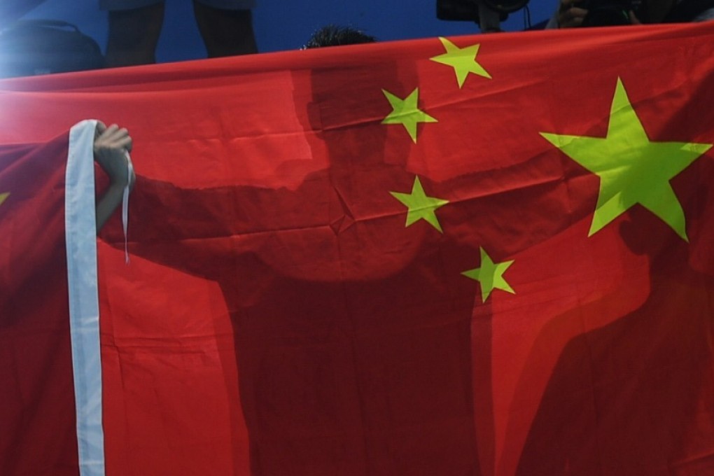 Gold medallist Sun Yang at the medal ceremony for the 2018 Asian Games 1,500m freestyle. Photo: Xinhua