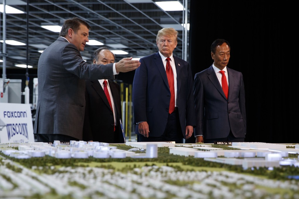 US President Donald Trump with Foxconn Chairman Terry Guo (right) on a tour of a Foxconn facility in Mount Pleasant, Wisconsin, in 2018. Photo: AP
