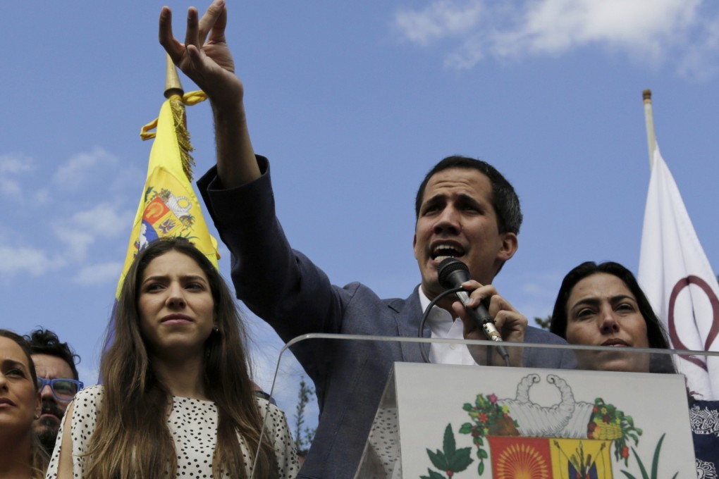 Venezuela's self-declared interim leader Juan Guaido speaks to supporters in Caracas on January 26. Photo: AP