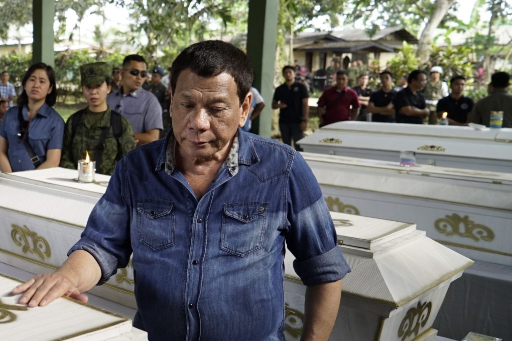 Philippine President Rodrigo Duterte at the wake for explosion victims in Jolo, Sulu province, southern Philippines in January. Photo: EPA-EFE