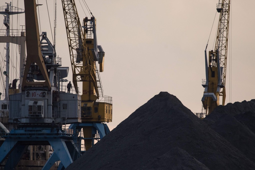 North Korean coal piled up on a dock at the port in Rason in 2017. File photo: AFP