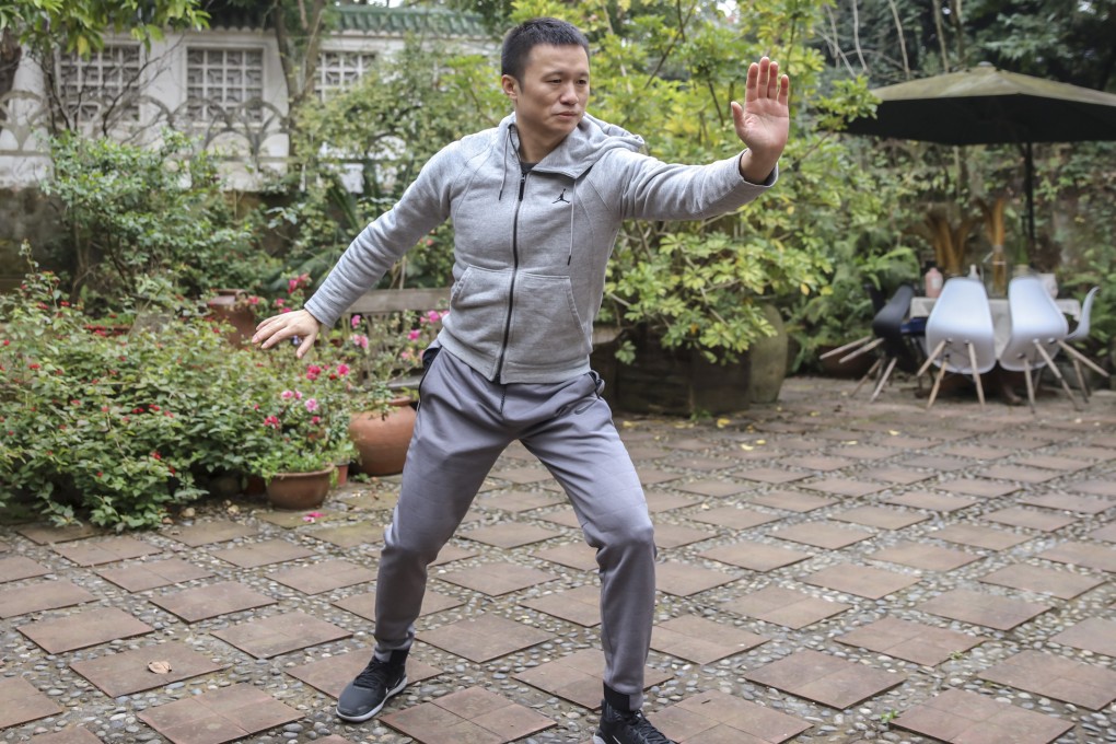 Kelvin Chen Chi, founder and chief executive of Xiaozhu, practice tai chi at the courtyard of a European-style villa in suburban Chengdu. Photo: Handout