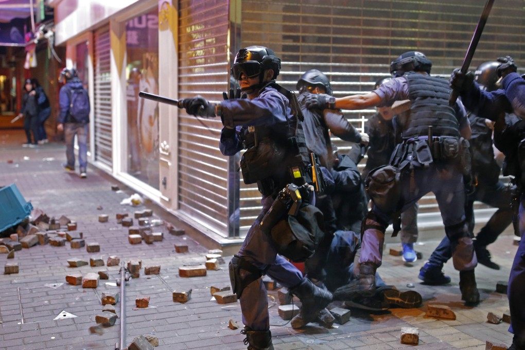 Rioting broke out in Mong Kok in 2016 following a hawker control operation. Photo: AP