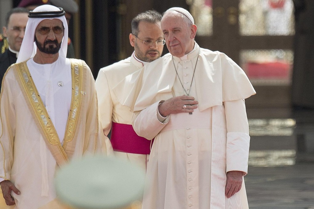 Pope Francis being received by Abu Dhabi’s Crown Prince Sheikh Mohammed bin Zayed Al Nahyan (right) at the presidential palace on Monday. Photo: EPA