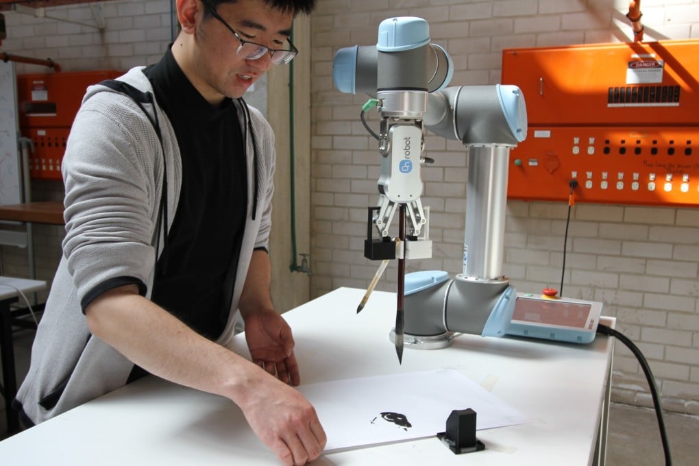 University of Sydney mechanical engineering student Wenzheng Zhang has programmed a robot that can produce a traditional Chinese ink painting, a style known as guóhuà.