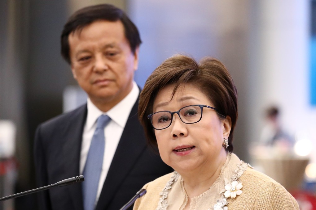 Laura Cha Shih May-lung, chairwoman of Hong Kong Exchanges and Clearing, speaks in June 2018, with Charles Li Xiaojia, HKEX chief executive, behind her. Photo: Nora Tam
