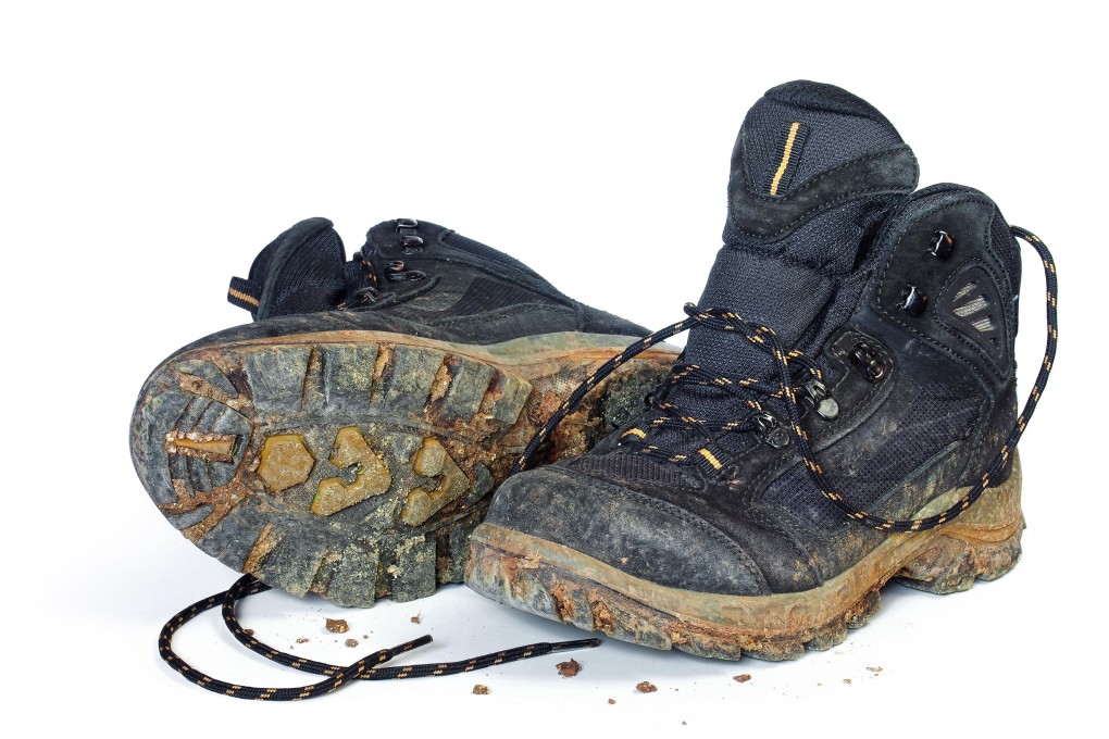 A pair of dirty hiking boots. Photo: Alamy