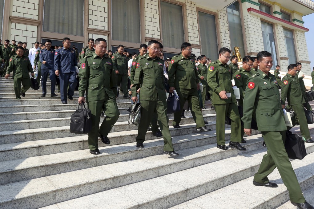 Military representatives following a regular session of parliament in Naypyidaw. Photo: AP