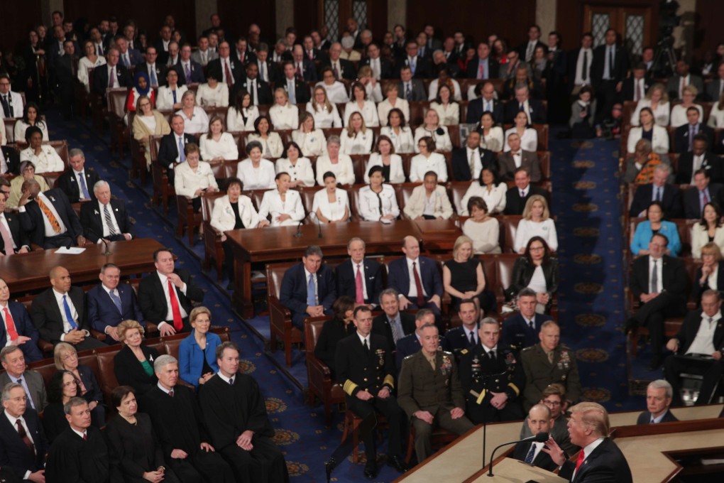 Seated together, the bloc of women lawmakers sent a striking visual message, a challenge to Donald Trump and how he and his administration have addressed issues important to women. Photo: AFP