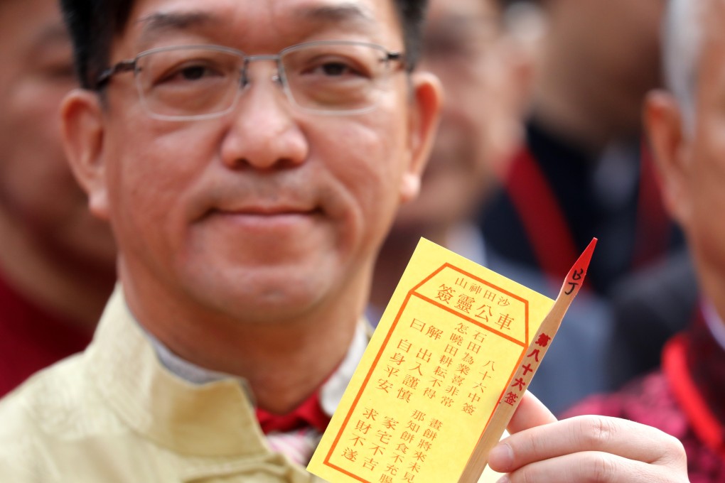 The fortune stick picked by lawmaker Kenneth Lau Ip-keung at the Che Kung Temple in Sha Tin seems to reflect the challenges facing the city. Picture: Dickson Lee