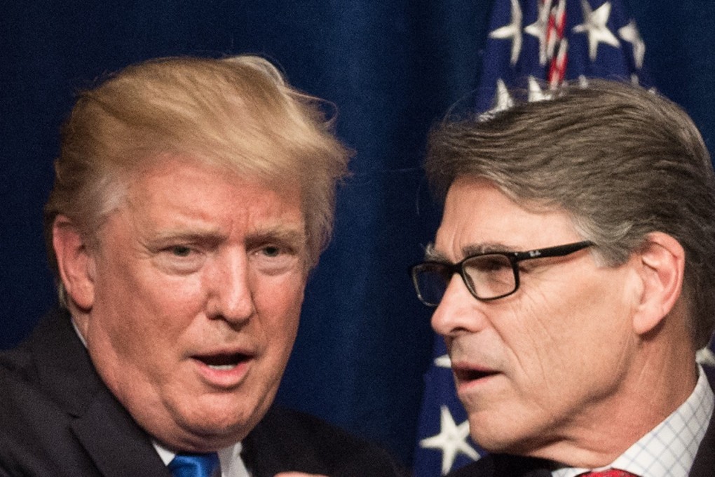 US President Donald Trump sand Energy Secretary Rick Perry. File photo: AFP
