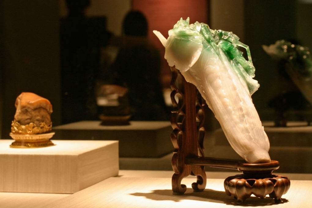 The “meat-shaped stone” and “jade cabbage” on display at the National Palace Museum in Taipei. Picture: Alamy