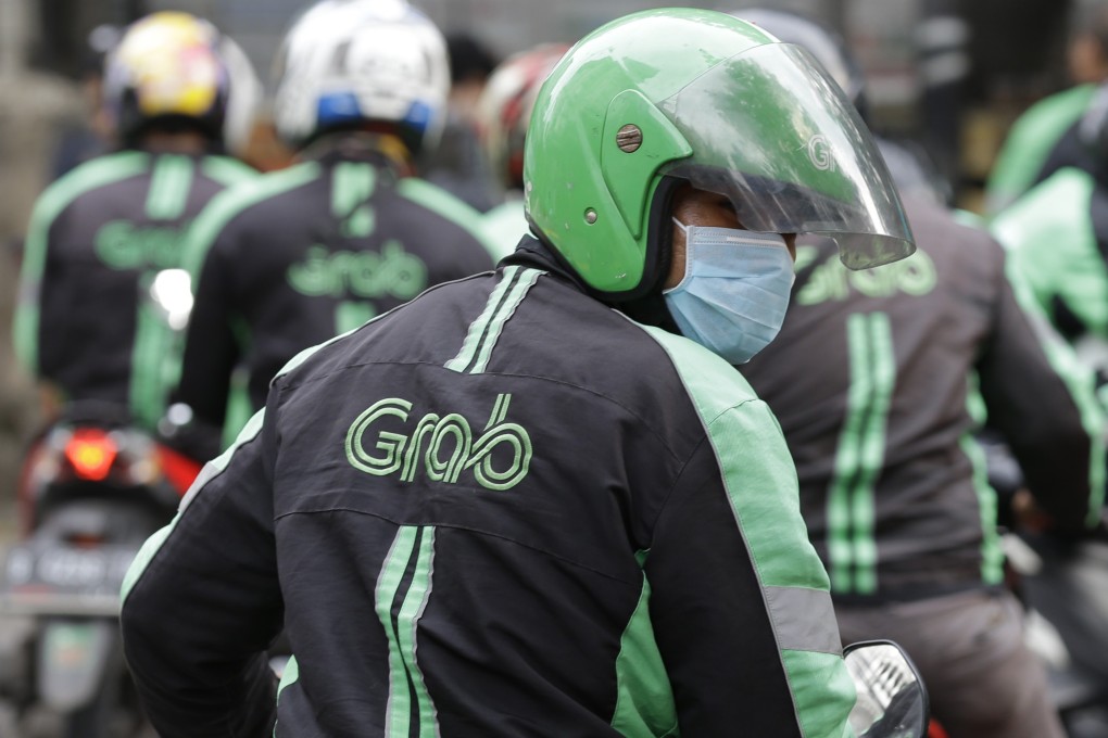 A GrabBike driver in Jakarta, Indonesia. Photo: AP