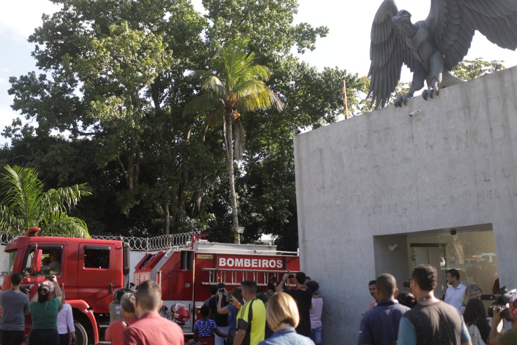 A fire engine is seen in front of the training centre of Rio’s soccer club Flamengo, after a deadly fire in Rio de Janeiro, Brazil. Photo: Reuters