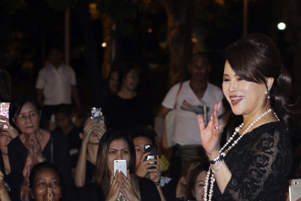 An October 2017 photo of Thai Princess Ubolratana waving to people outside the Grand Palace in Bangkok, Thailand. Photo: AP
