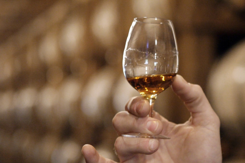 Hong Kong adopted zero duty on wine in 2008, but kept its 100 per cent tax on liquor with an alcoholic strength of more than 30 per cent by volume. Photo: AP