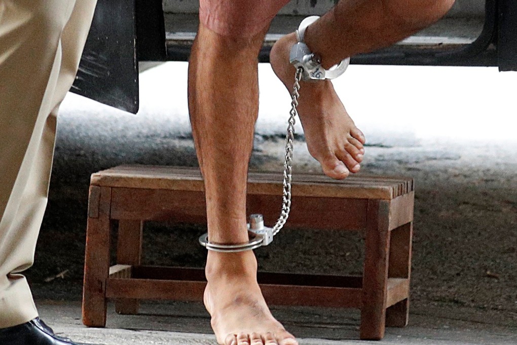 Hakeem al-Araibi arrives at a Bangkok court in chains. Photo: Reuters