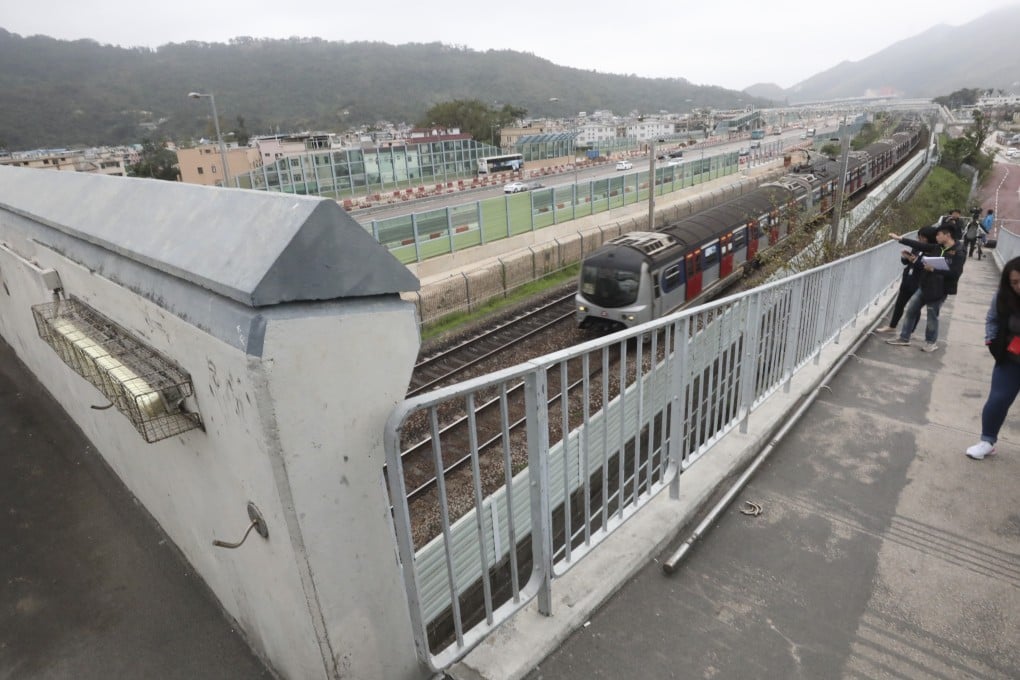 A section of handrail ripped away from the wall lies on a footbridge near Tai Po. Photo: Felix Wong