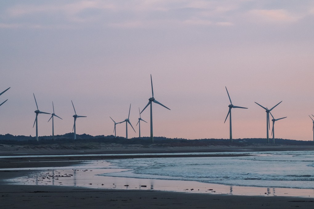Wind turbines along a beach in Taiwan. Its ministry of economic affairs said on January 30 the offshore wind tariff reductions introduced are ‘fair and reasonable’. Photo: Bloomberg
