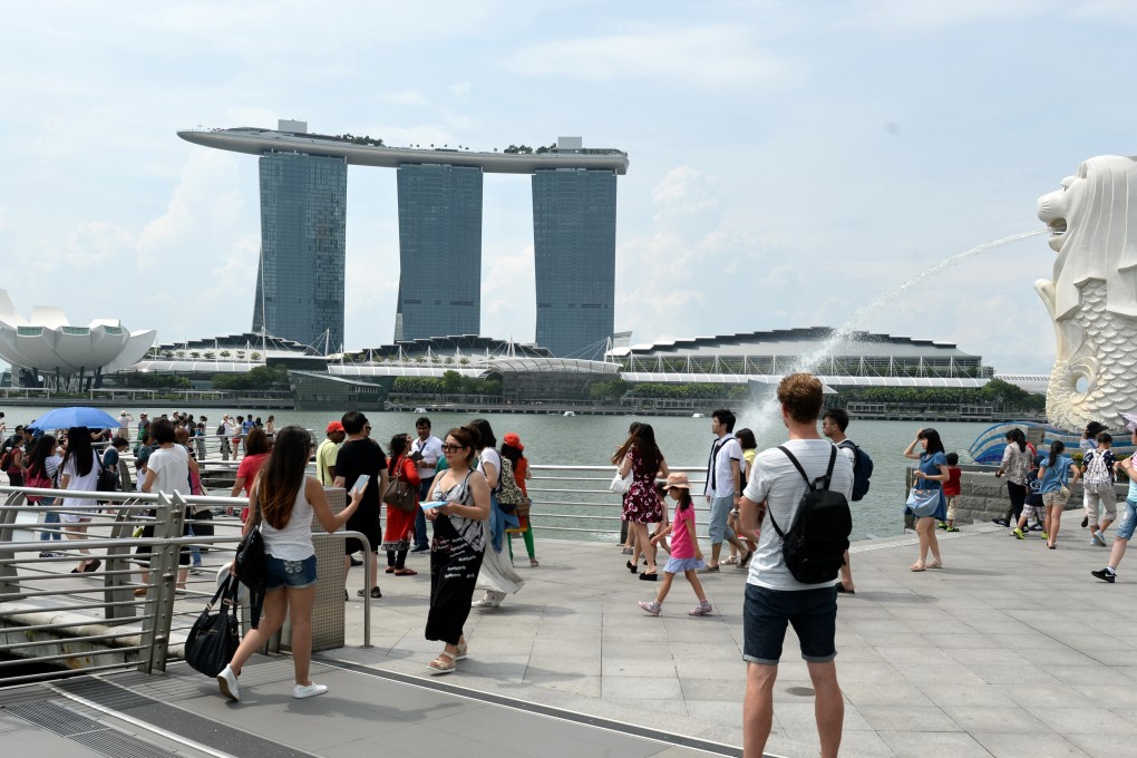 Singapore is home to almost 250,000 domestic helpers, mostly from other parts of Southeast Asia. Photo: AFP