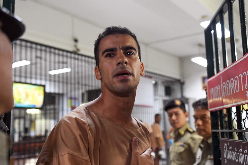 Hakeem al-Araibi, a Bahraini refugee and Australian resident, is escorted to a courtroom in Bangkok. Thailand has ended the extradition proceedings against the footballer. Photo: AFP