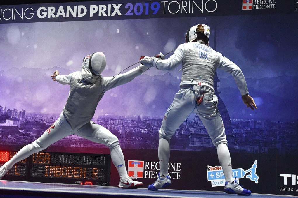 Hong Kong’s Cheung Ka-long (left) in the final against Race Imboden of the United States. Photos: FIE