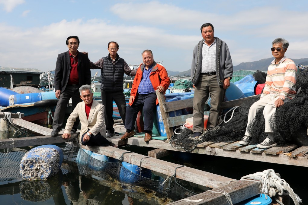 Farmers (from left to right) Lee Muk-kam and Lee Kan, with Shek Kwong-yin, Sam Mun Tsai village representative, former fisheries lawmaker Wong Yung-kan, Ho Yi, and Ng Ngau-tai at the Sam Mun Tsai fish farm in Tai Po. Photo: K.Y. Cheng