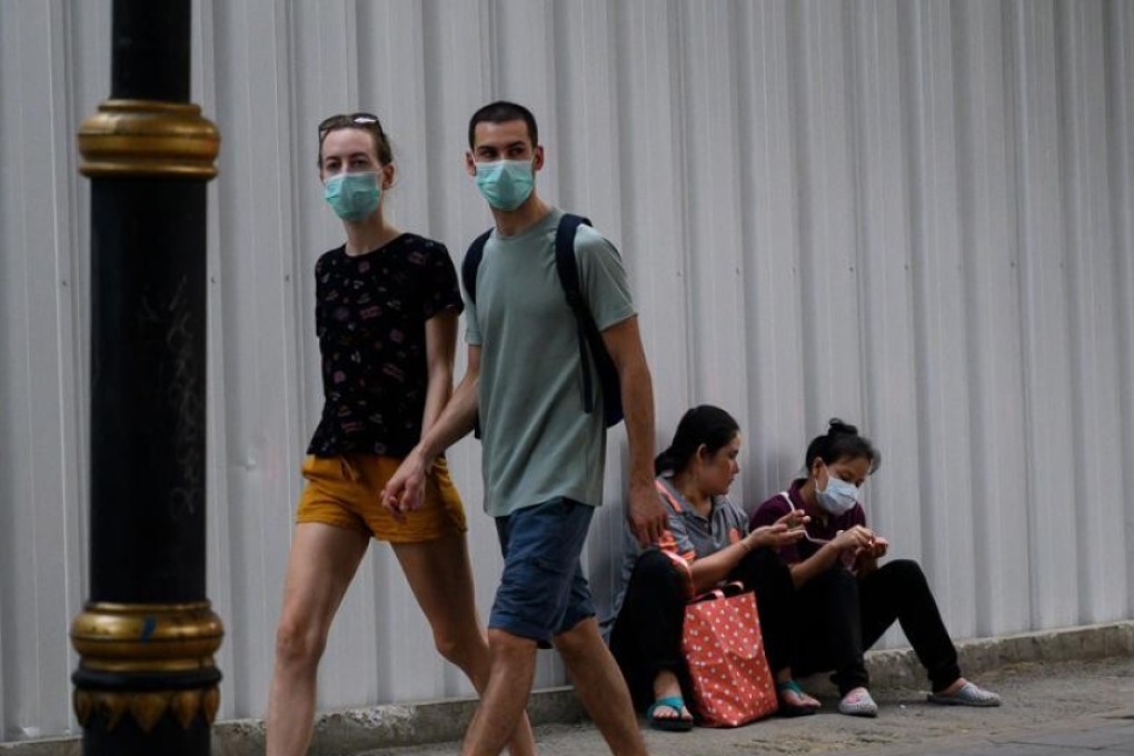 People wearing face masks in Bangkok, on January 31. Picture: AFP