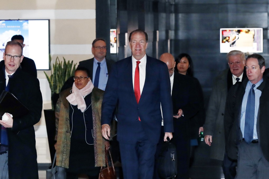 David Malpass (centre) and his fellow US delegates prepare for a second day of talks in Beijing on Tuesday. Photo: EPA-EFE