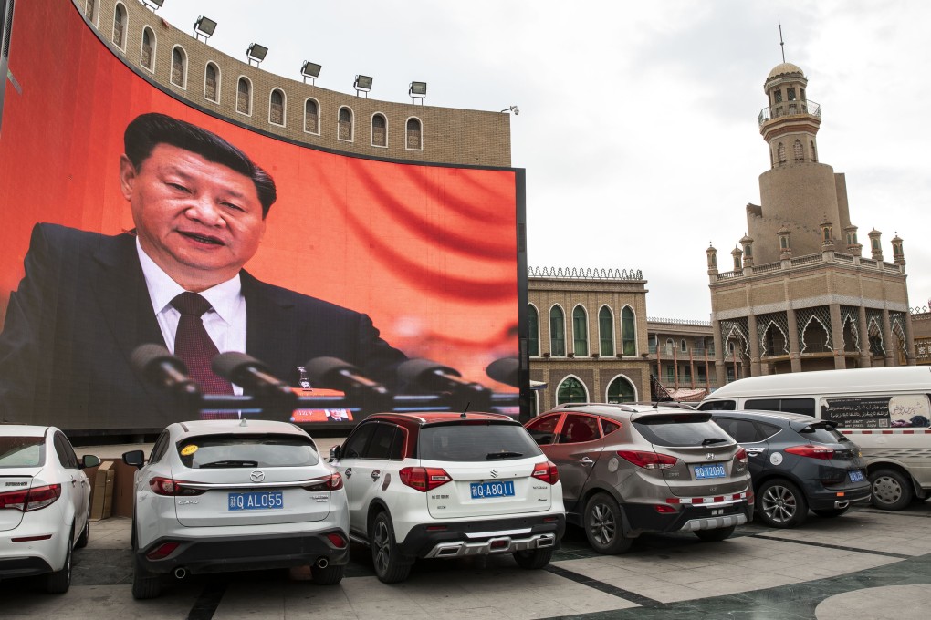 An image of Chinese President Xi Jinping is seen on a screen at a car park in Kashgar, Xinjiang. China’s detention of Muslim Ugyurs in mass camps has raised an international outcry. Photo: Bloomberg