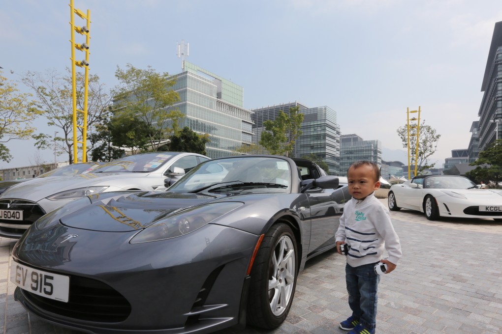 A young fan of electric vehicles at the Charged Hong Kong 2015 Rally in Sha Tin. Photo: Edward Wong