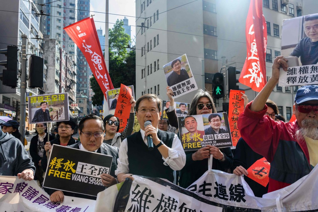 Activists march in support of jailed Chinese human rights lawyer Wang Quanzhang (pictured right on placard) and China’s first “cyber-dissident” and underground human rights website founder, Huang Qi (pictured left), in Hong Kong on January 29. The freedom of speech and religious practice have been curtailed in recent years in mainland China. Photo: AFP