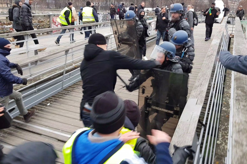 Christophe Dettinger clashes with riot police in Paris in January. File photo: AFP
