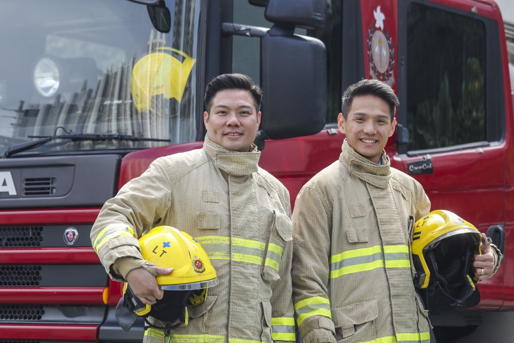 Firefighters Kelvin Lau Kin-each (left) and Chan Yee-leung, who helped calm kindergarten pupils after a bus crash on January 18, pictured at Lam Tin Fire Station. Photo: Xiaomei Chen