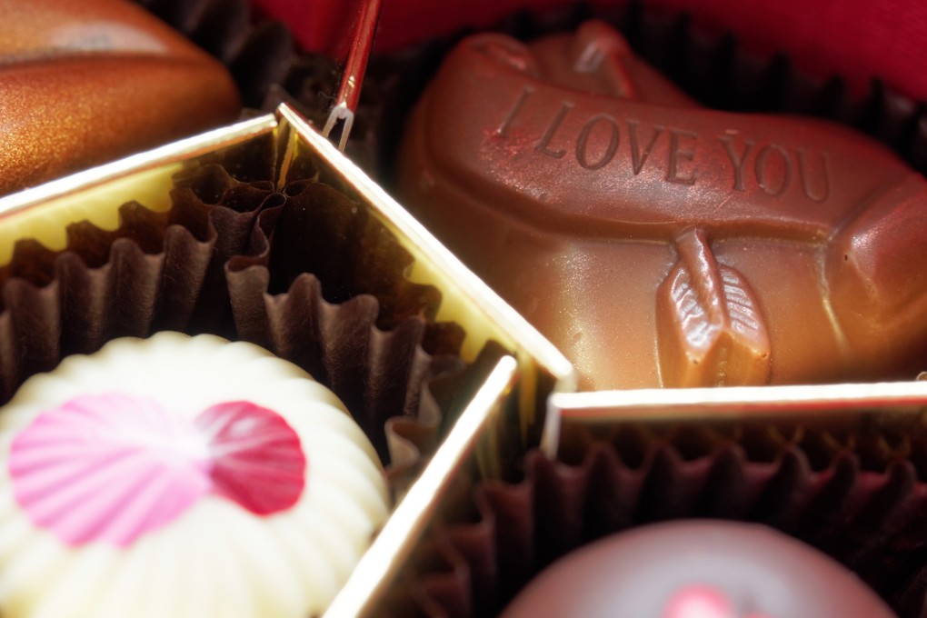 Romantic Hongkongers have been spending more money on Valentine’s Day gifts such as flowers and chocolates, as well as dinners and hotel breaks. Photo: Dreamstime
