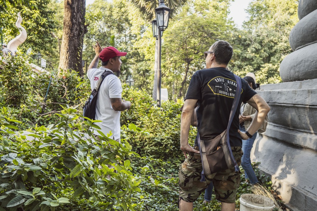 Buck Billy and tour guests visit a temple off the main tourist track in Wat Phnom. Photo: Enric Catala
