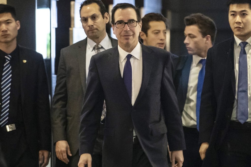 US Treasury Secretary Steven Mnuchin (centre) leaves a hotel in Beijing. Photo: Bloomberg