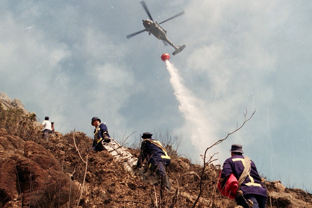 Rescuers search for survivors at the scene of the fire in 1996. Picture: SCMP